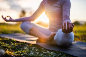 Close up of meditation at a park at sunrise